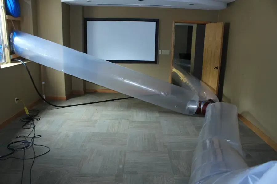 Layflat drying duct pushing dry air into a room in a Lilburn home